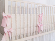 White linen crib bumper with pink  ties